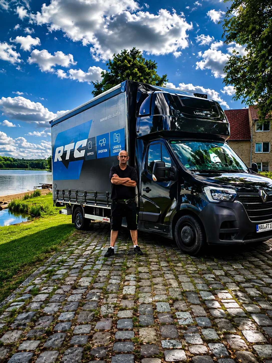 RTC employee in front of an RTC van